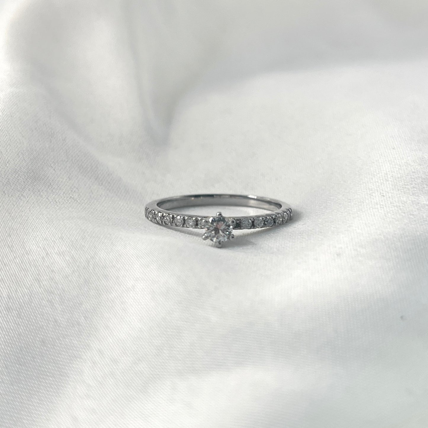 Solitaire Side Stone Engagement RingER016